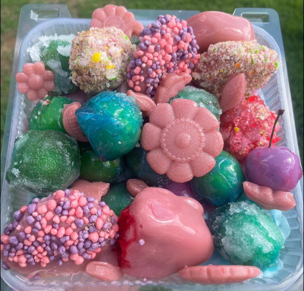 Mixed candied fruit tray with flowers and candy coatings